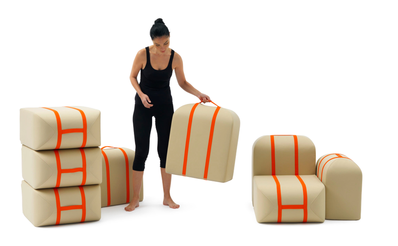 Illustration for article titled This Shape-Shifting Sofa Stacks Itself Like Suitcases